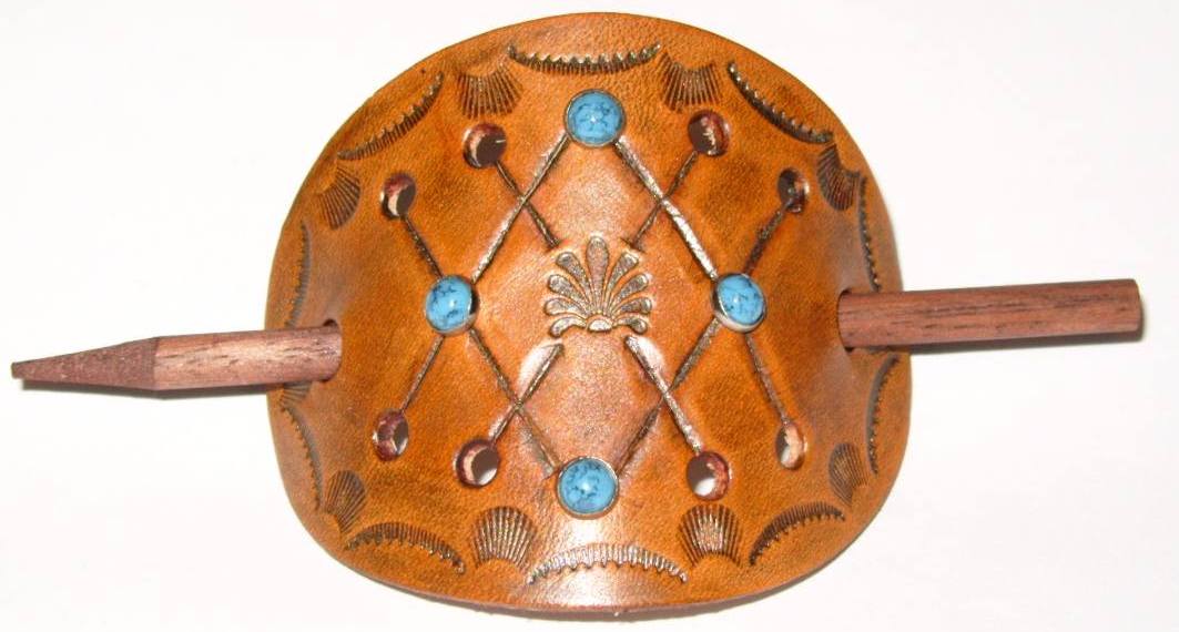 Barrette with spray and turquoise rivets Barrette with spray and turquoise rivets